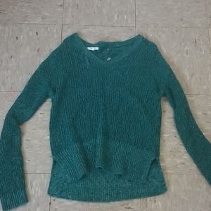 Cute sweater, fits medium sized people.